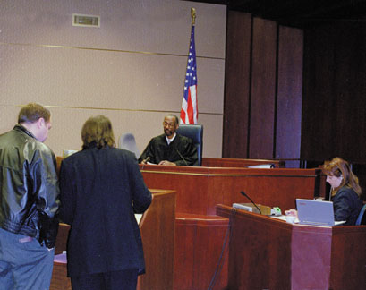 Image individuals giving testimony in court