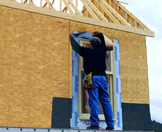 Picture of carpenter working on new house