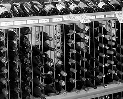 Report cover image of racks of wine bottles