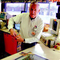 Image of vendor selling Minnesota State Lottery scratch-off games